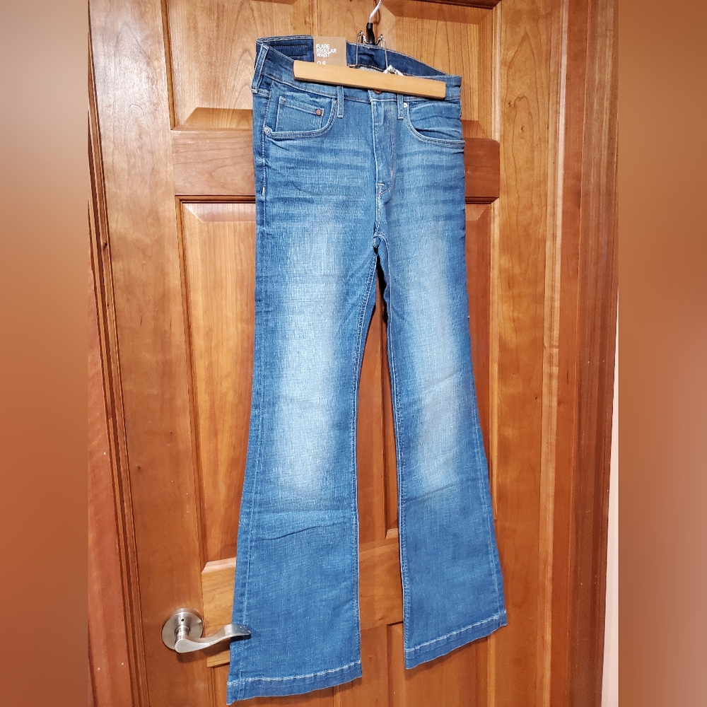 New H&M women's flare cut reg waist jeans European size 29/30